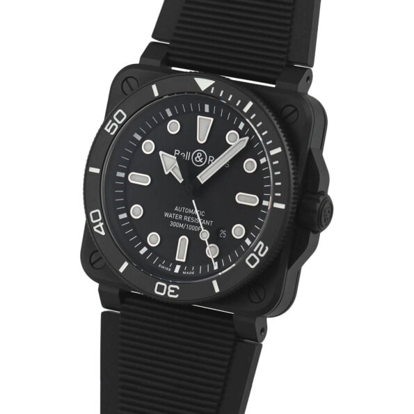 Side angle of the Bell & Ross BR 03 Diver, highlighting its robust black ceramic case, screw-down crown with protective guards, and a knurled edge for secure grip, ensuring water resistance.