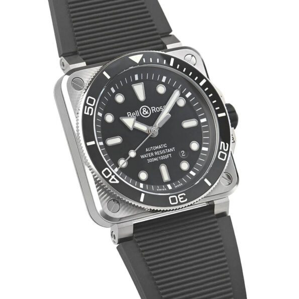 Close-up of the BR 03 Diver's black rubber strap with a ribbed texture, secured by a black steel pin buckle, designed for durability and comfort during diving.