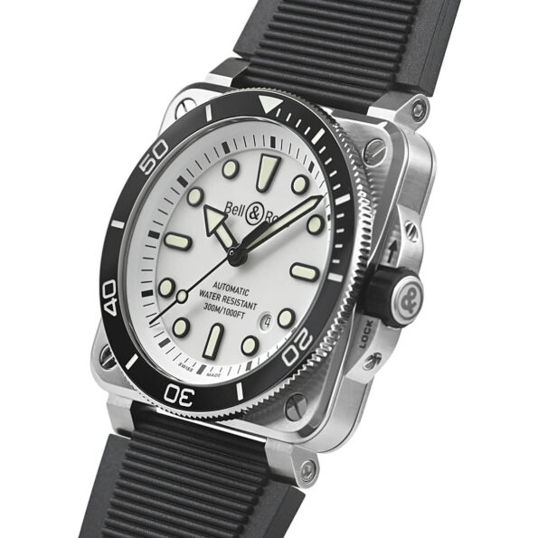 Profile view of the BR 03 Diver White Steel showcasing its angular stainless steel case with satin finish, prominently displayed screw-down crown with protective guards, and distinctive case geometry that ensures 300m water resistance.