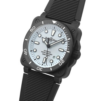 Profile view of the BR 03 Diver Full Lum showing its matte black ceramic case with brushed finish, screw-down crown with protective guards, and distinctive angular lugs - all highlighted with subtle green luminous accents along the case edges.